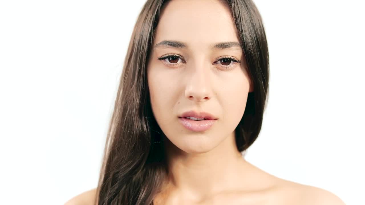 Download Video Stock Closeup Of Beautiful Surprised Woman On White Background Live Wallpaper For PC