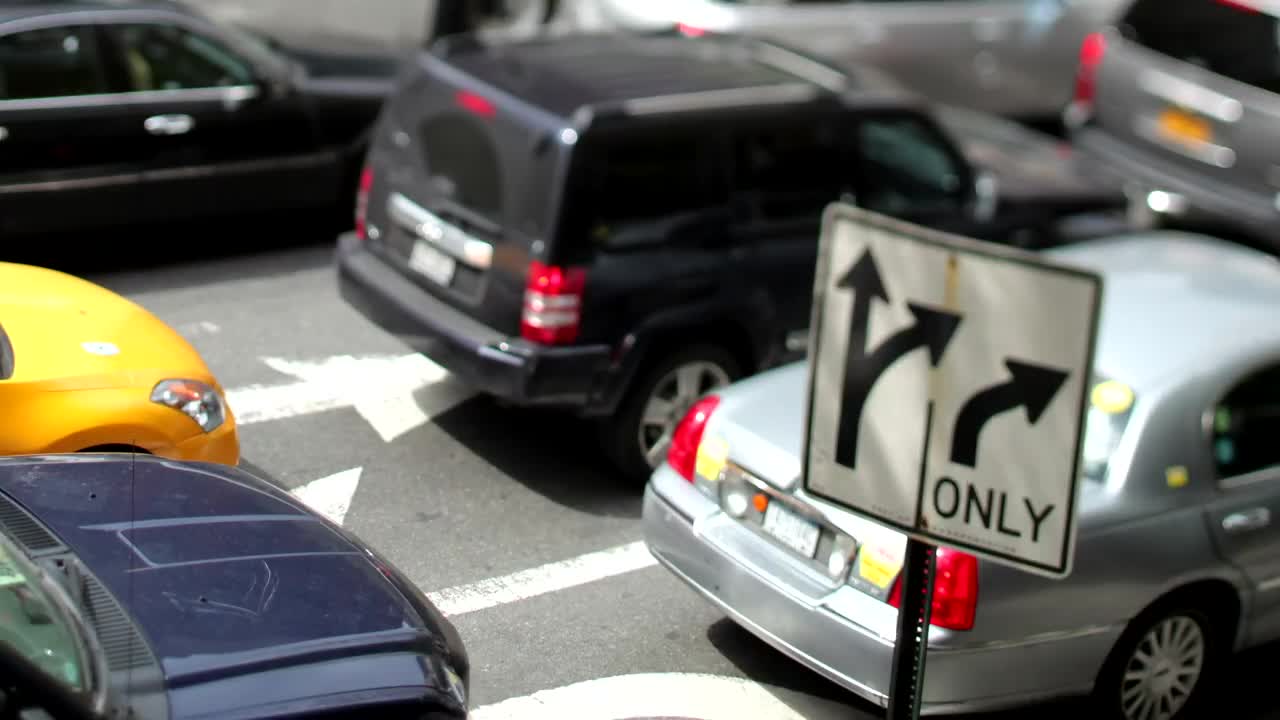 Download Video Stock Close Up Shot Of Highway Traffic Near A Sign Live Wallpaper For PC