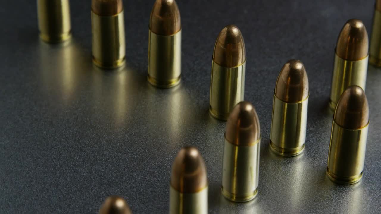 Download Video Stock Close Up Of Rotating Bullets Live Wallpaper For PC