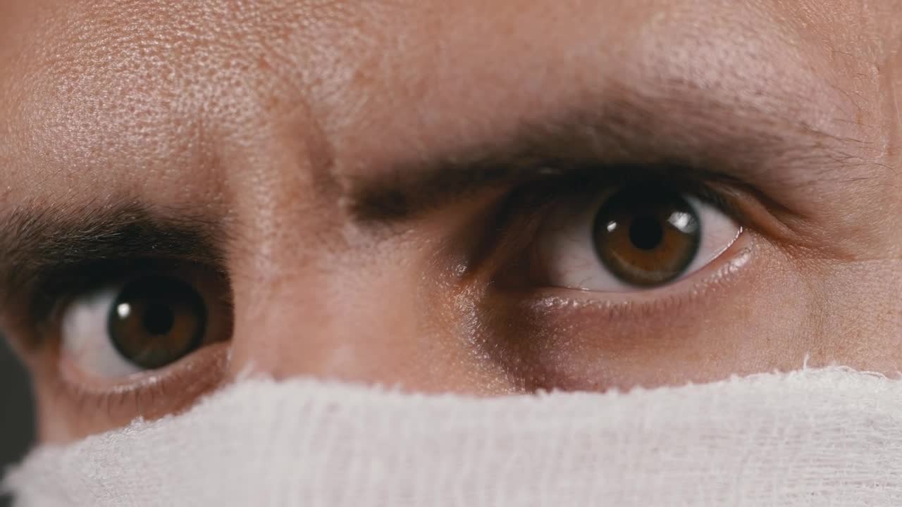 Download Video Stock Close Up Of A Man Wearing A Face Mask Thinking Live Wallpaper For PC