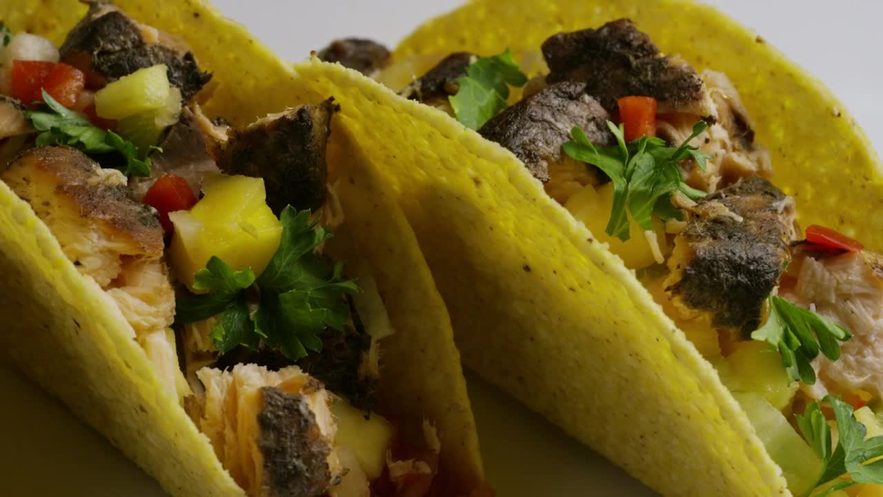 Download Video Stock Close Shot Of A Couple Of Tacos On A Plate Live Wallpaper For PC