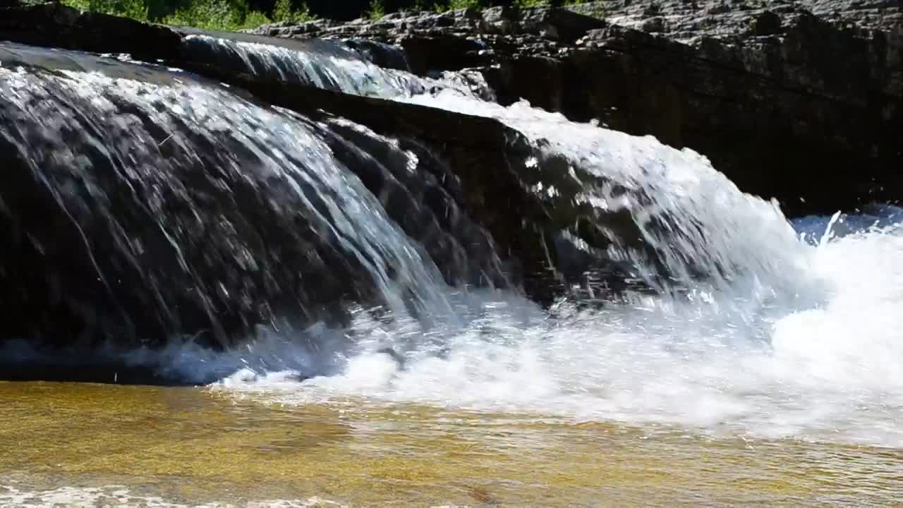 Download Video Stock Clear River Waters Breaking Over A Rock Live Wallpaper For PC