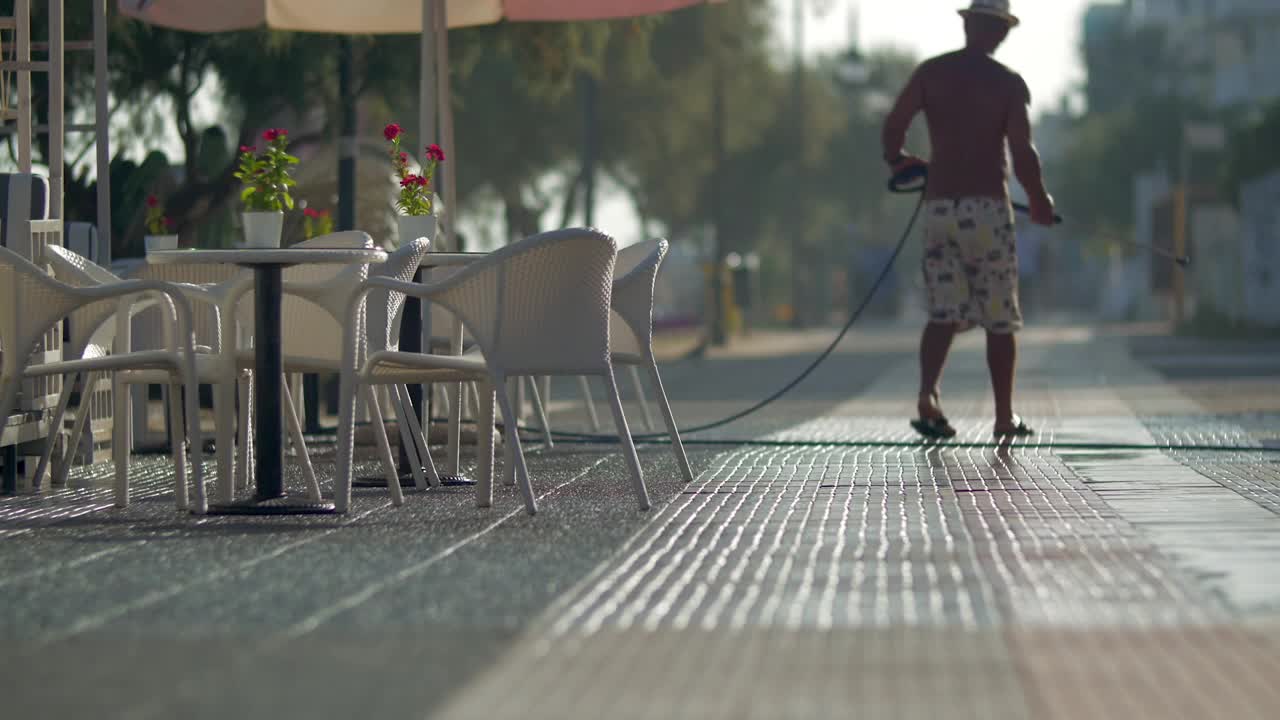 Download Video Stock Cleaning The Street Outside A Cafe Live Wallpaper For PC