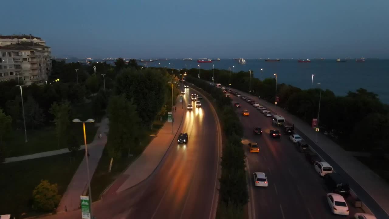 Download Video Stock City Traffic During The Dusk Near The Seashore Live Wallpaper For PC