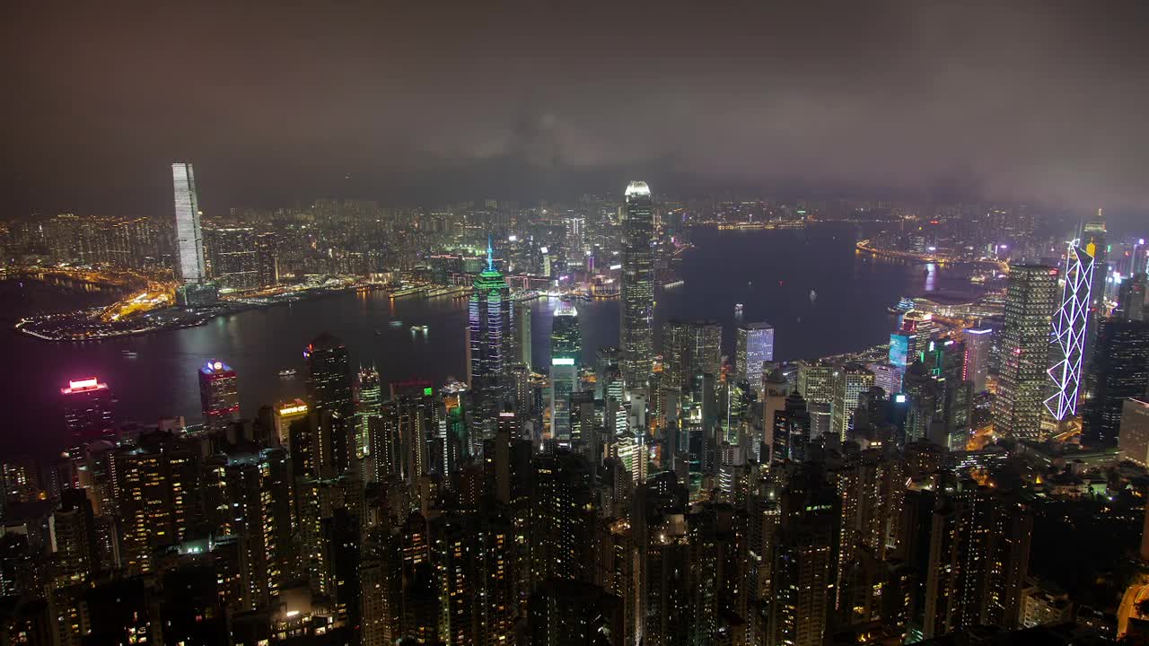 Download Video Stock City Of Huge Buildings With A River At Night Live Wallpaper For PC