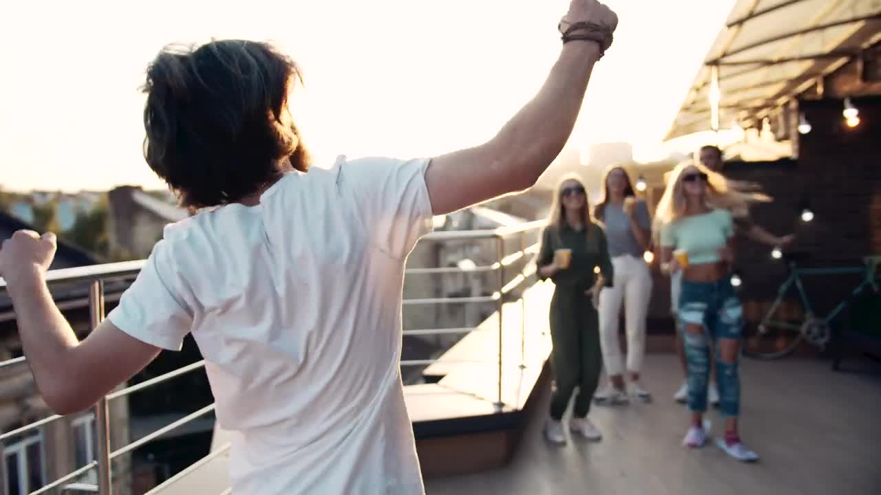 Download Video Stock Cinematic Of Friends Dancing On Terrace Party Live Wallpaper For PC