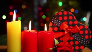 Video Stock Christmas Candles Next To A Heart Shaped Gift Live Wallpaper For PC