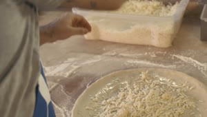 Video Stock Chef Tossing Grated Cheese On A Pizza Live Wallpaper For PC