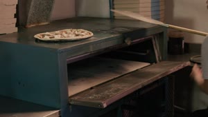 Video Stock Chef Puts The Pizza In The Oven Live Wallpaper For PC
