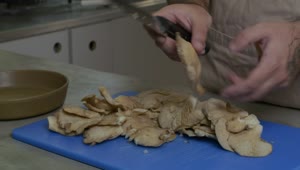 Video Stock Chef Chopping Mushrooms In The Kitchen Live Wallpaper For PC