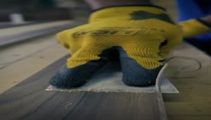Video Stock Carpenter Cutting Down A Board With A Putty Knife Live Wallpaper For PC