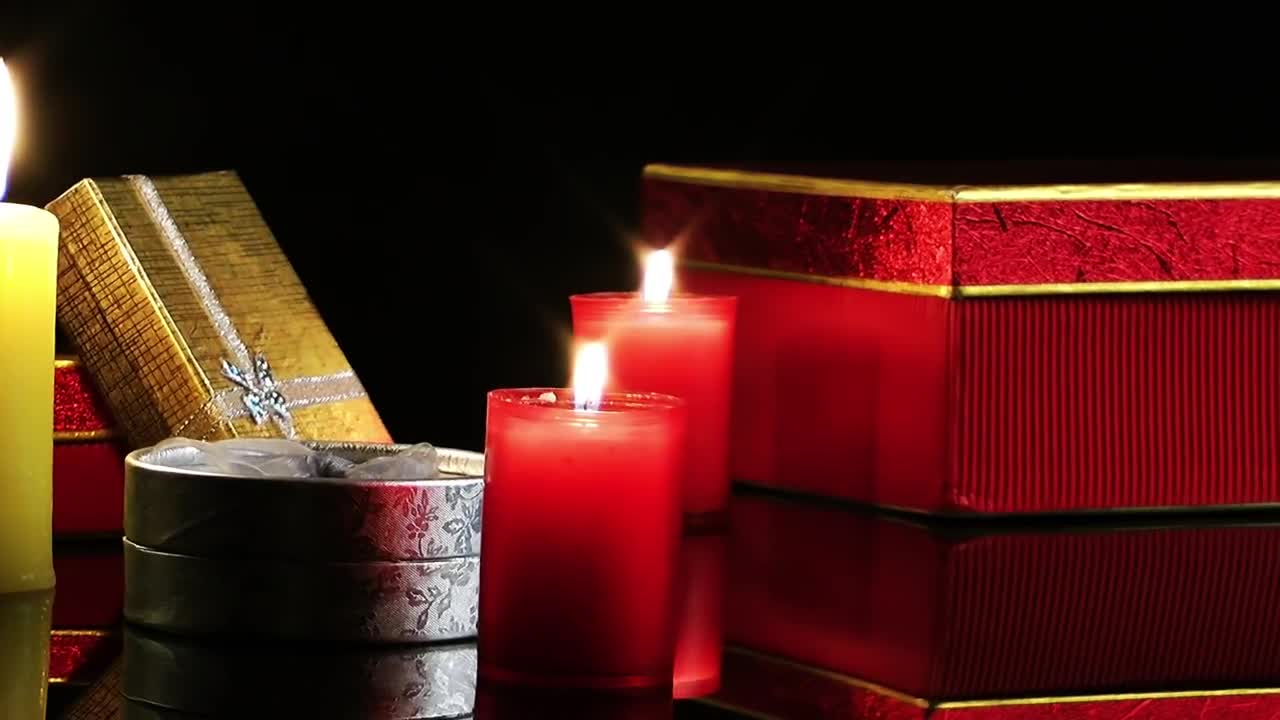 Download Video Stock Candles And Gifts On A Dark Background Live Wallpaper For PC