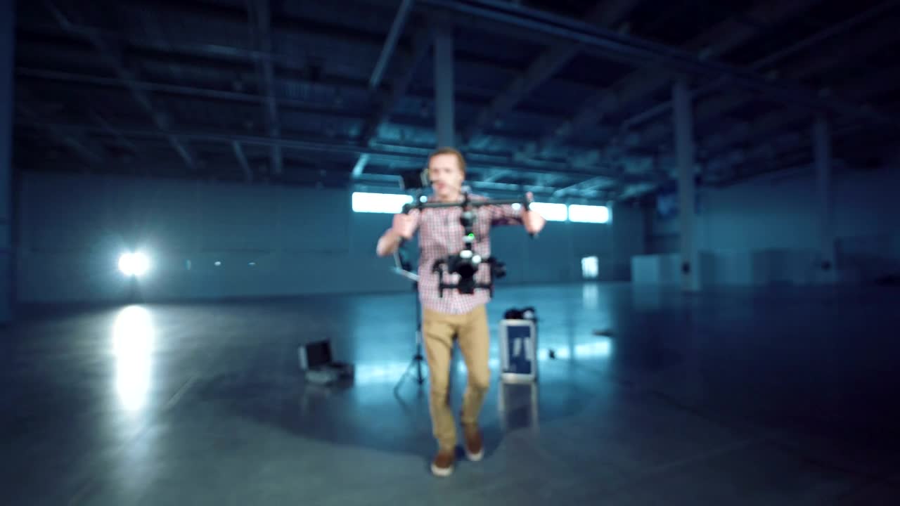 Download Video Stock Cameraman Walking With A Camera Stabilizer Live Wallpaper For PC