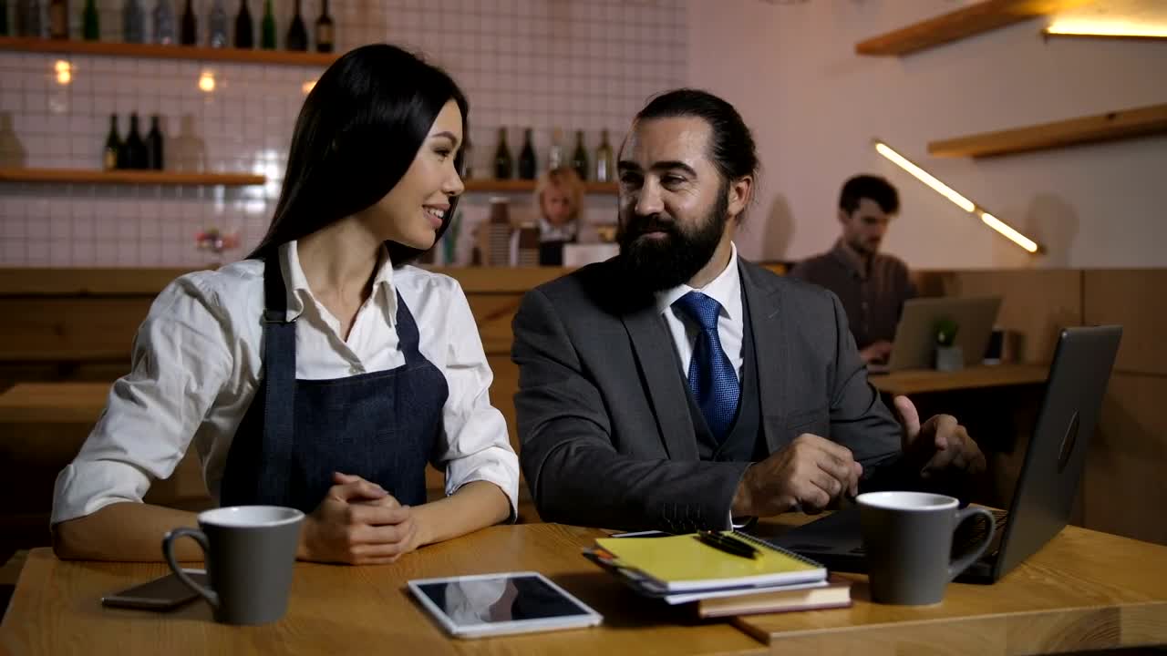 Download Video Stock Cafe Owner Discussing Business Live Wallpaper For PC