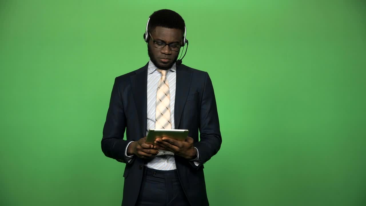 Download Video Stock Businessman With Headset And Tablet Live Wallpaper For PC