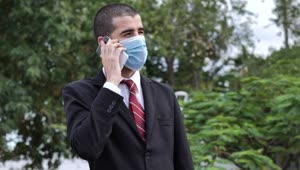 Video Stock Businessman In Suit Wearing Face Mask While Talking On The Live Wallpaper For PC