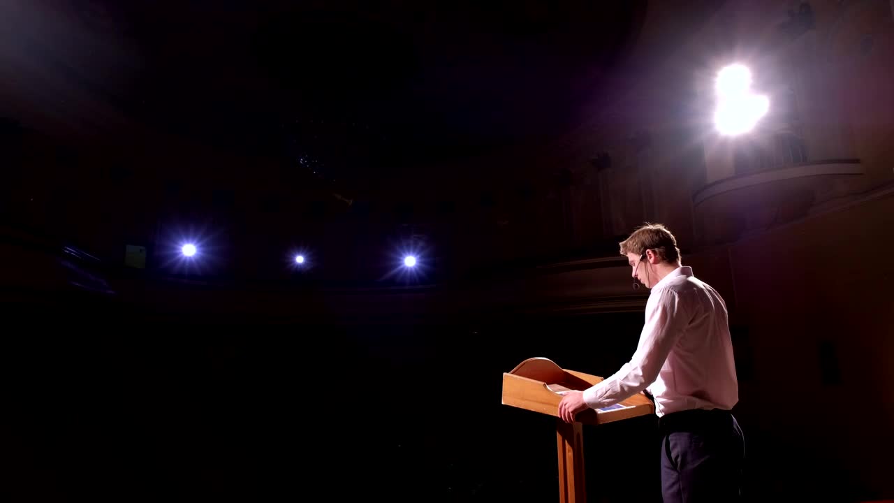 Download Video Stock Businessman Gives A Talk In An Auditorium Live Wallpaper For PC