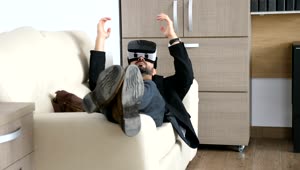 Video Stock Businessman Enjoys Vr Innovation On Sofa In Office Live Wallpaper For PC