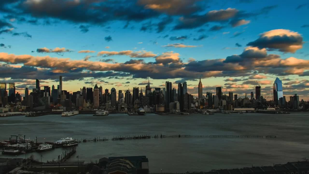 Download Video Stock Clouds Moving Above The City Skyline Live Wallpaper For PC