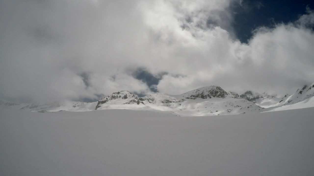 Download Video Stock Clouds In Snowy Mountain Live Wallpaper For PC