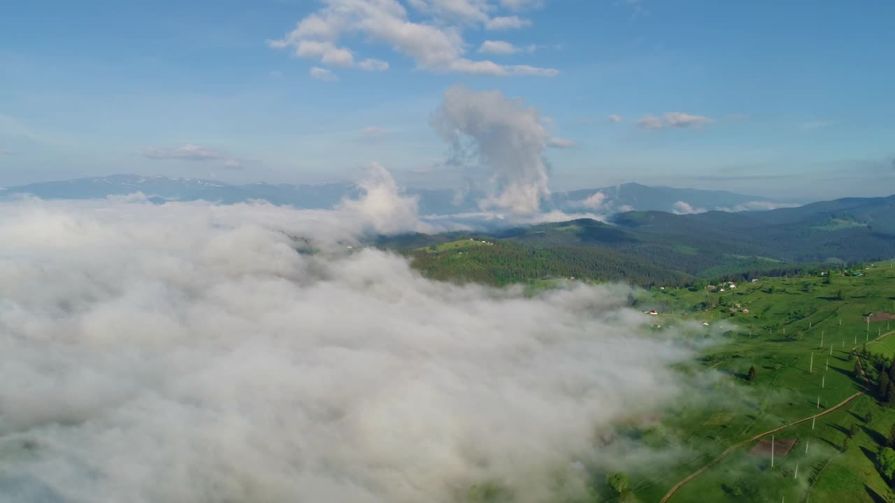 Download Video Stock Clouds Covering High Mountains In Spring Live Wallpaper For PC