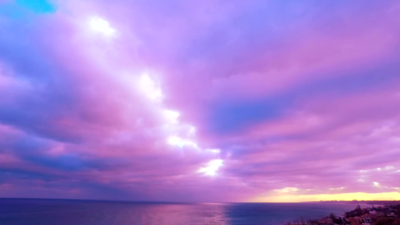 Download Video Stock Clouds Colored In Pink And Violet In The Sunset Live Wallpaper For PC
