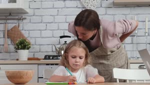 Stock Video Daughter Drawing In The Kitchen With Mom Live Wallpaper For PC