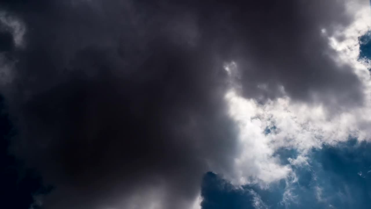 Download Stock Video Dark Clouds Forming On A Sunny Day Live Wallpaper For PC