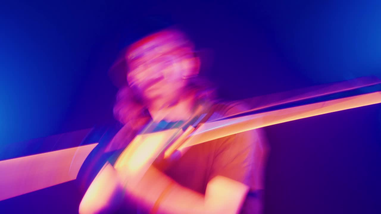 Download Stock Video Dancer Dancing With A Light Bar In His Hands Live Wallpaper For PC