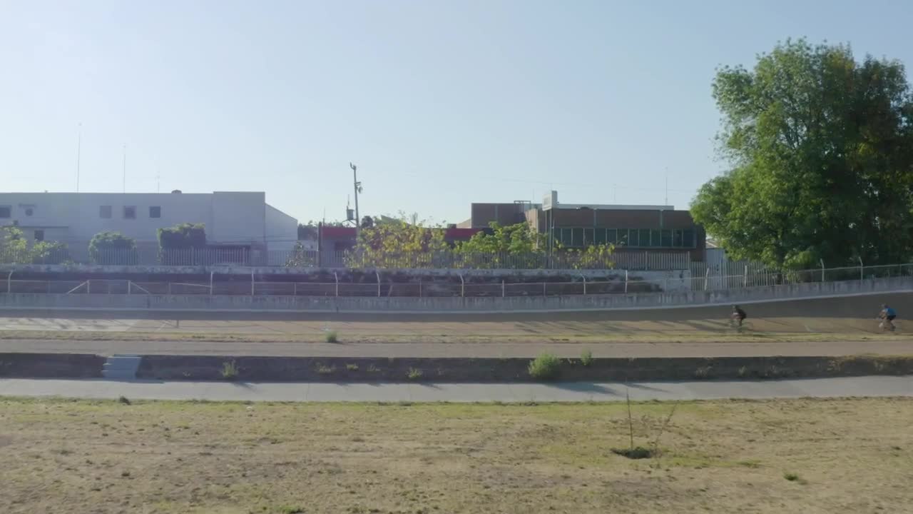 Download Stock Video Cyclists Competing On An Outdoor Track Live Wallpaper For PC