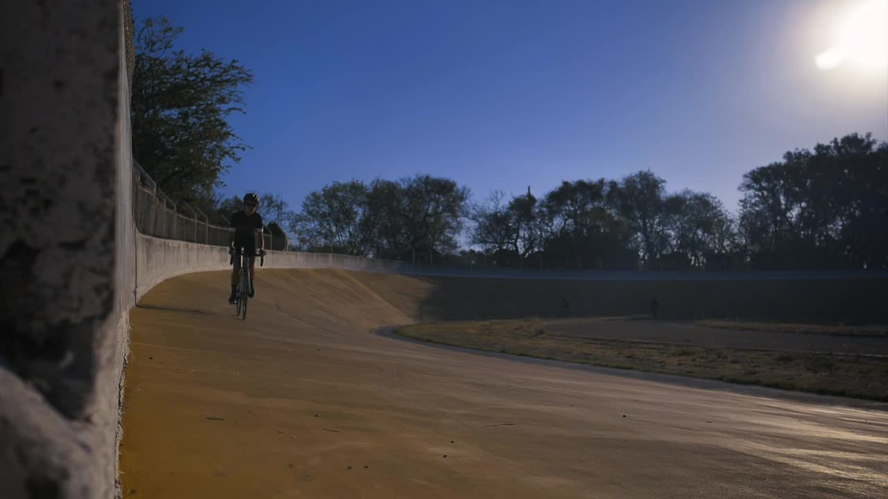 Download Stock Video Cyclist Riding A Track In A Park Live Wallpaper For PC