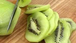 Stock Video Cutting Up Kiwi On A Table Live Wallpaper For PC