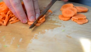 Stock Video Cutting Up Carrots Into Small Chunks Live Wallpaper For PC