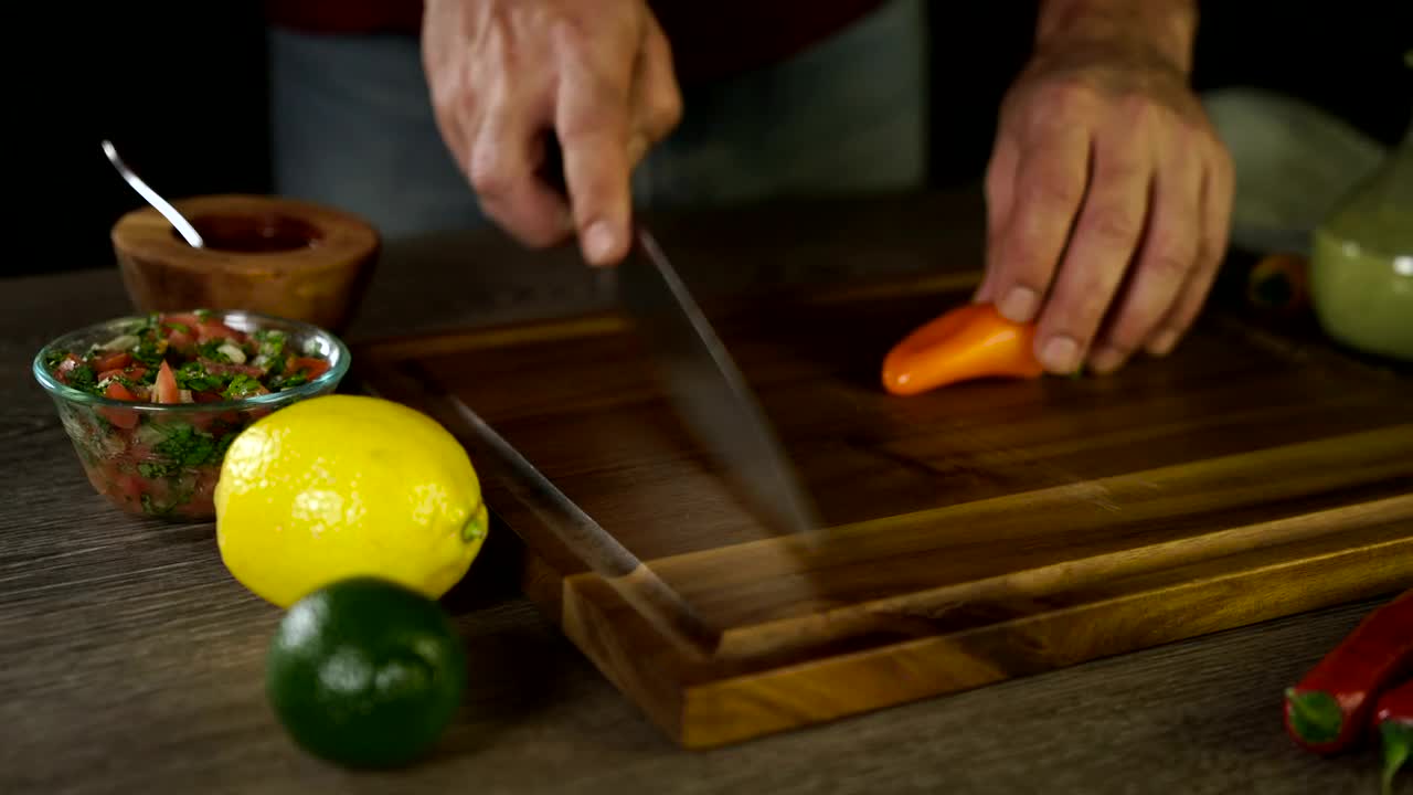 Download Stock Video Cutting Up An Orange Pepper Live Wallpaper For PC