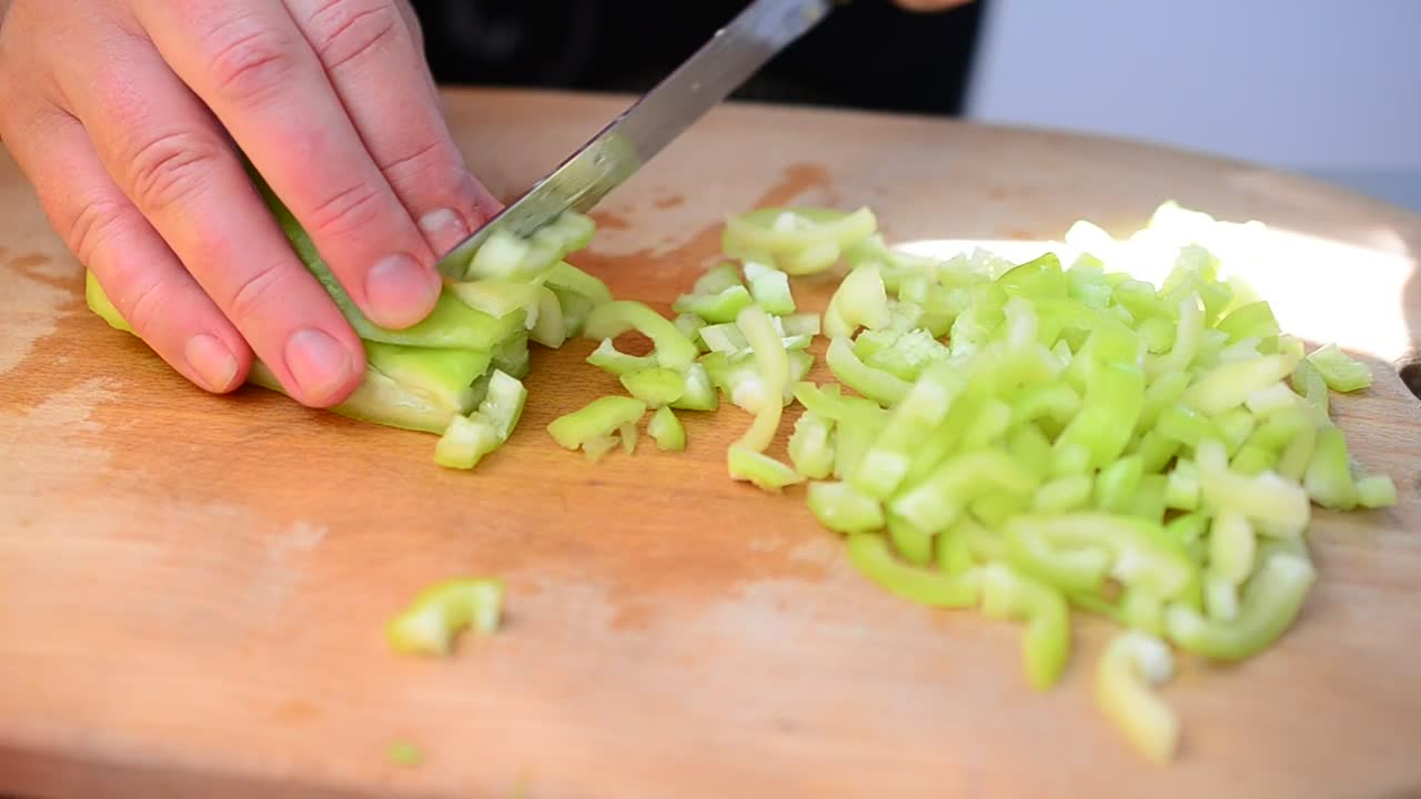 Download Stock Video Cutting Up A Pepper In The Kitchen Live Wallpaper For PC
