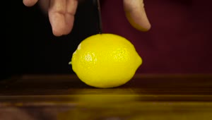 Stock Video Cutting Through A Lemon With A Knife Live Wallpaper For PC