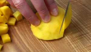 Stock Video Cutting Mango On A Board Close Up Live Wallpaper For PC