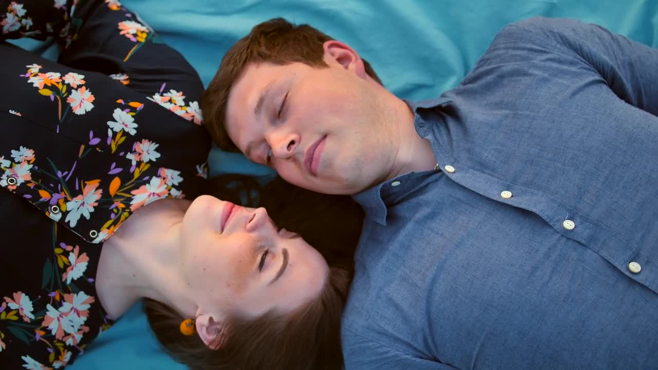 Download Stock Video Cute Happy Couple Lying On The Grass Live Wallpaper For PC