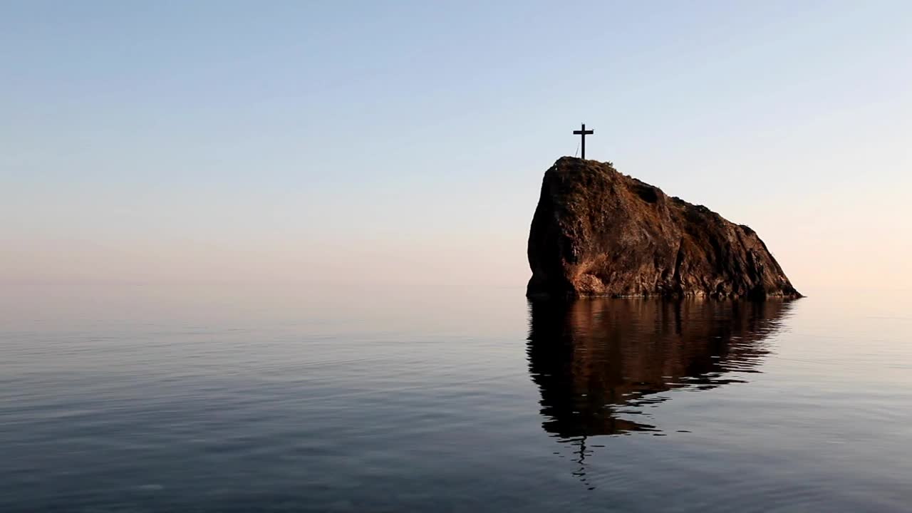 Download Stock Video Crucifix On A Cliff In The Sea Landscape Live Wallpaper For PC