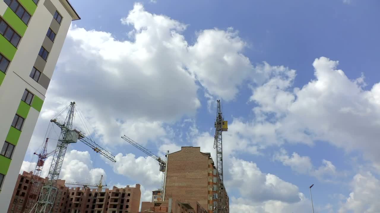 Download Stock Video Cranes Working On New Apartments Live Wallpaper For PC