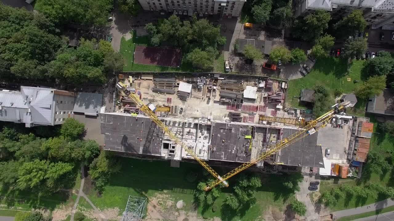 Download Stock Video Cranes Moving Above A Construction Project Live Wallpaper For PC