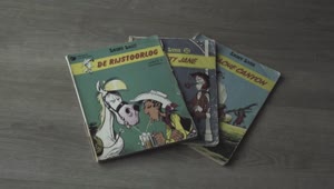 Stock Video Covers Of Three Vintage Lucky Luke Comics Live Wallpaper For PC