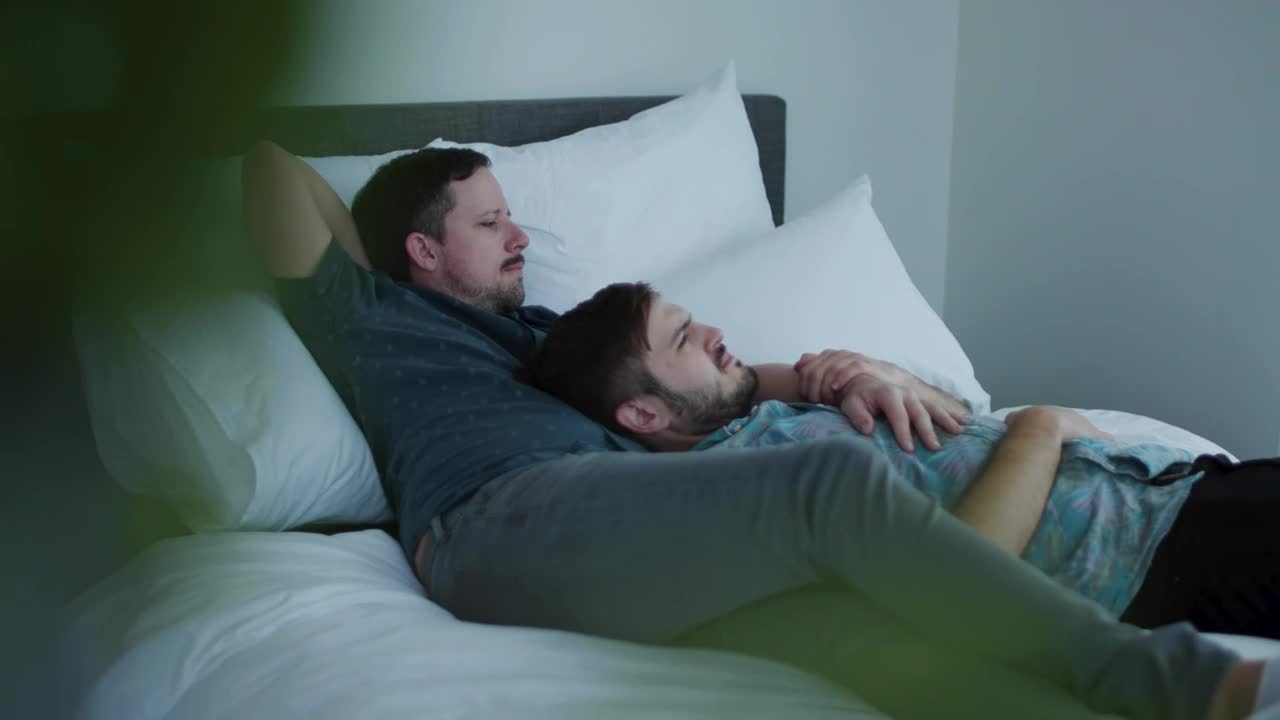 Download Stock Video Couple Resting On A Bed Live Wallpaper For PC