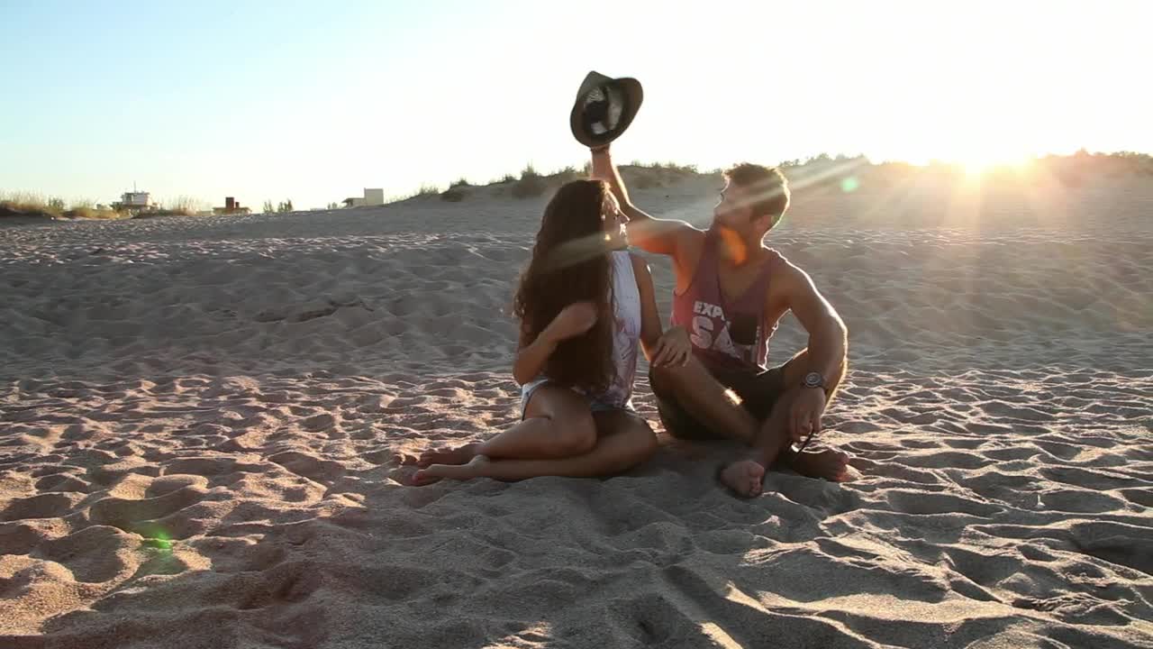 Download Stock Video Couple On The Beach During Sunset Live Wallpaper For PC