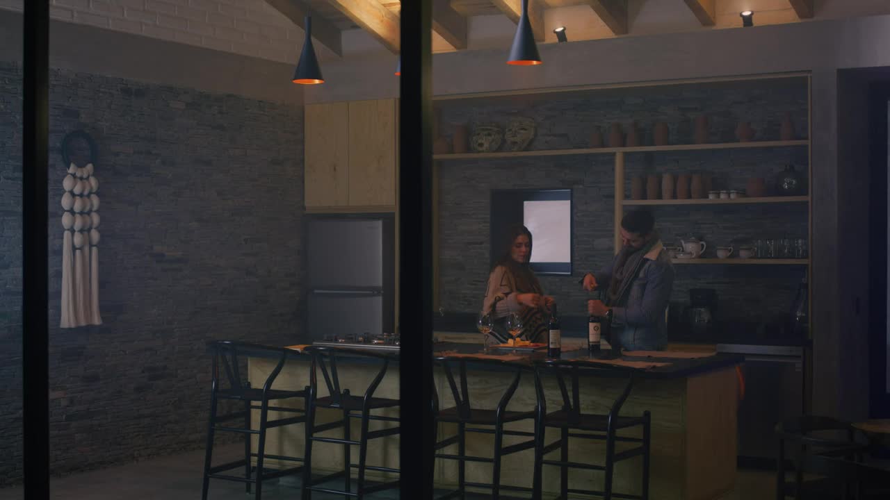 Download Stock Video Couple In A Kitchen Preparing Appetizers Live Wallpaper For PC