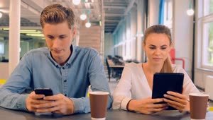 Stock Video Couple In A Cafe Connected On Their Devices Live Wallpaper For PC