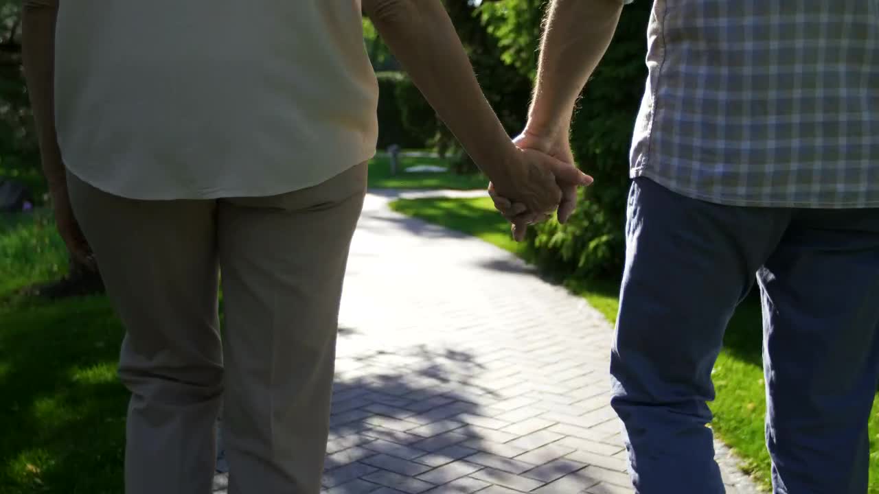 Download Stock Video Couple Holding Hands In The Park Live Wallpaper For PC