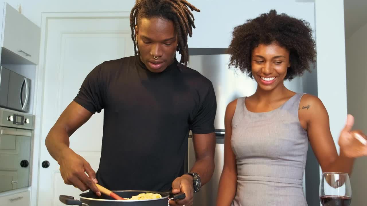 Download Stock Video Couple Having Fun While Cooking Live Wallpaper For PC