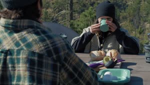 Stock Video Couple Having Breakfast In A Campsite Live Wallpaper For PC