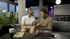 Stock Video Couple Brainstorming With A Tablet Live Wallpaper For PC